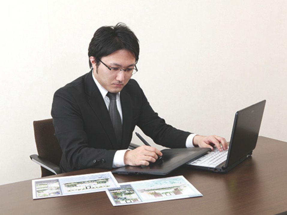 手続きを行うスタッフ